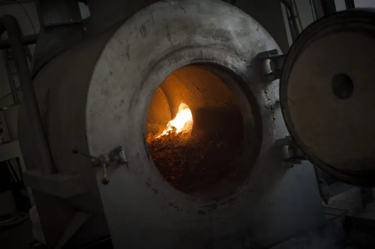 The refining furnace glowing during processing